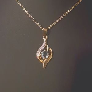 Light Blue Topaz, CZ, Gold W/ Ilver accents necklace